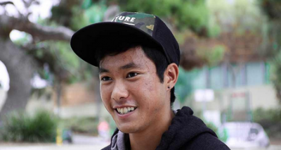 Portrait of a male student wearing a baseball cap